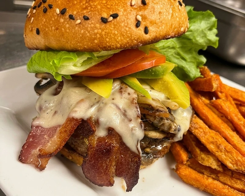 Nick's Burger with bacon, Swiss and avocado at Nick's Lounge in Bonnyville, AB